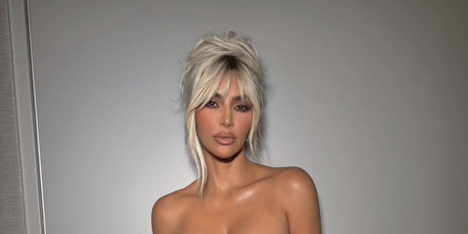 Kim Kardashian just underwent a major beauty transformation with butt-skimming red hair