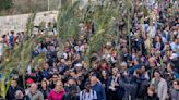 Christian faithful attend Palm Sunday celebrations in Jerusalem against backdrop of war