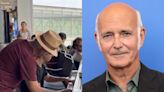 Ludovico Einaudi stuns fan by joining him on the piano at an airport