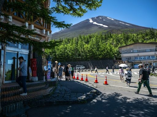 Crowd control at Japan's Mount Fuji as hiking season begins