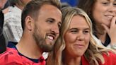Harry Kane cuddles his wife after a nervy win over Serbia