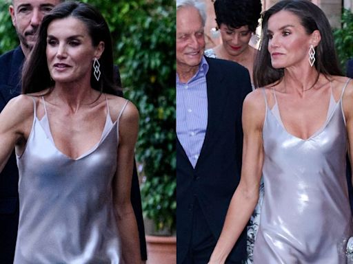 Queen Letizia of Spain Embraces the Liquid Look in Sleeveless Boss Dress With Michael Douglas for Atlántida Mallorca Film...