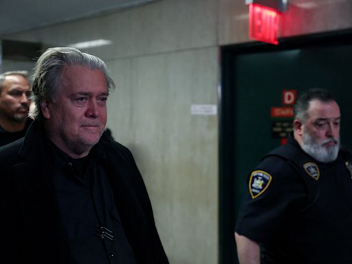 Trump aide Steve Bannon reports to federal prison for defying House subpoena about Jan. 6 Capitol attack