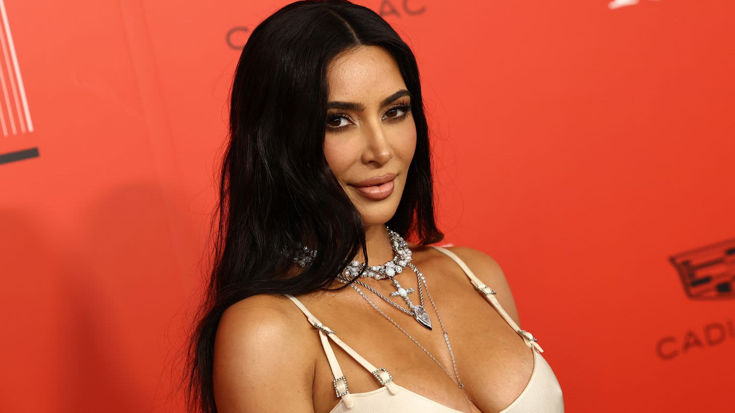 Kim Kardashian's Plunging Latex Halter Top Exposed Her Entire Midriff