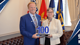 Navy CIO Jane Rathbun Receives 1st Wash100 Award From Jim Garrettson at Pentagon