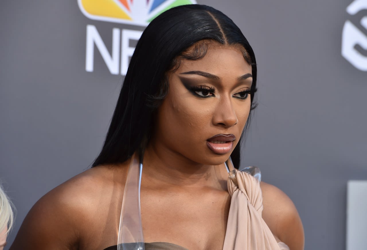 Photographer alleges he was forced to watch Megan Thee Stallion have sex and was unfairly fired