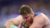 Paris Olympics: American Ryan Crouser becomes first man to win three straight Olympic shot put gold medals; U.S. also takes silver
