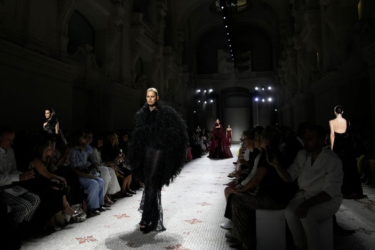 Elie Saab’s classic fall couture has foliage, shimmer — and capes for men