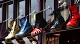 Dr Martens holds guidance, says trading in line