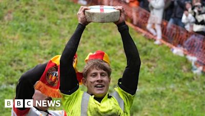 Gloucestershire cheese rolling attracts thousands of fans