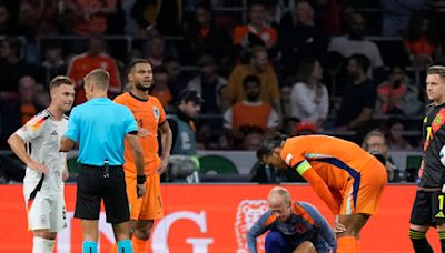 Nathan Ake carried off as Netherlands and Germany draw in Amsterdam