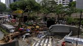 Tree falls on road, monorail track in KL city centre during storm, blocking road traffic and disrupting train service