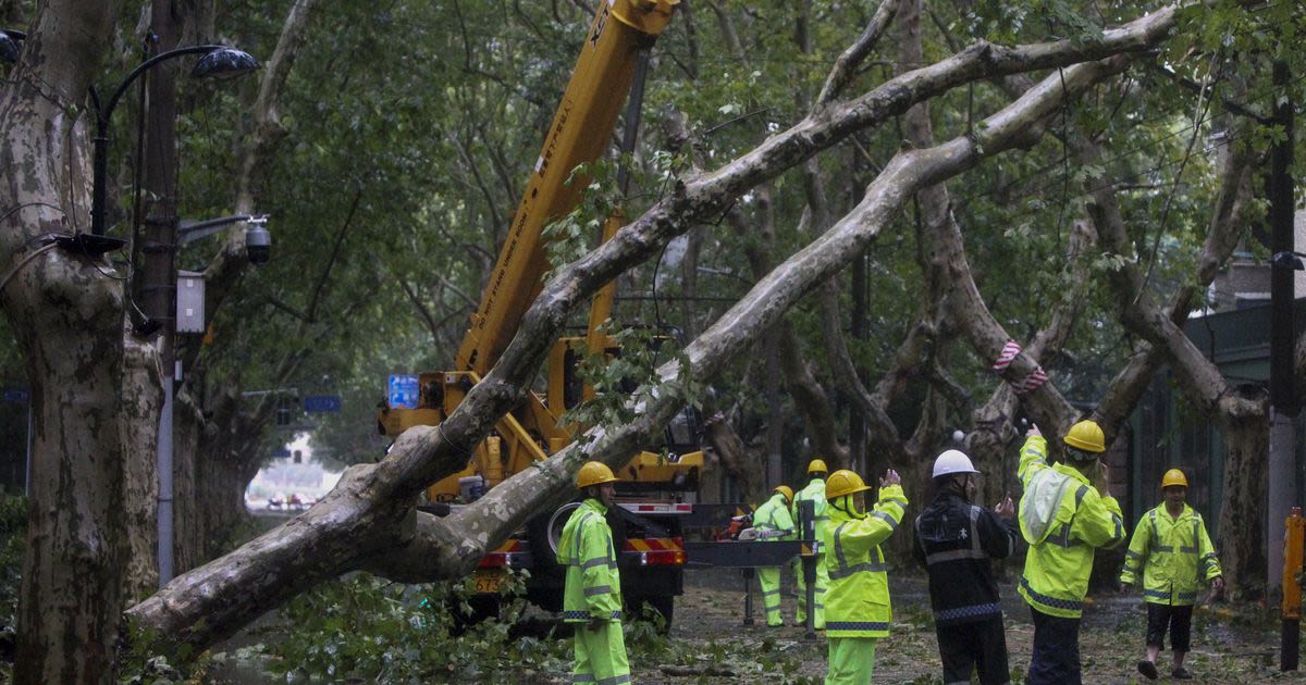 2 people reported dead in China as Typhoon Bebinca is downgraded to a tropical storm