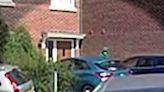 Moment figure paces outside house raided after Southport attack