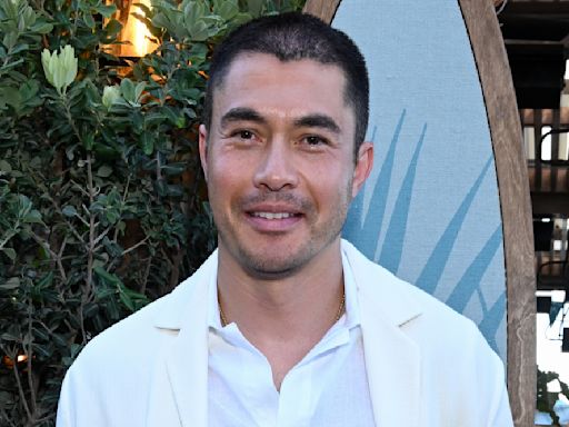 Henry Golding Says ‘A Simple Favor 2’ Is ‘Much More Bananas,’ Explains Cutting Off His Hair After ‘Nine Perfect...