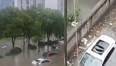 安徽合肥城區積水嚴重 車泡水地鐵樓梯成瀑布