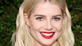 Lucy Boynton transforms her signature platinum blonde hair to fiery red