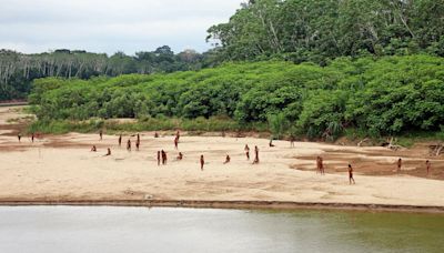 Uncontacted Tribe Emerges From Rainforest