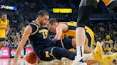 Sandfort scores 26, Perkins 24 and Iowa topples Michigan 88-78