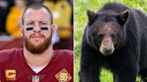 An NFL quarterback who killed a black bear as part of his 'bucket list' is being called 'barbaric' on social media