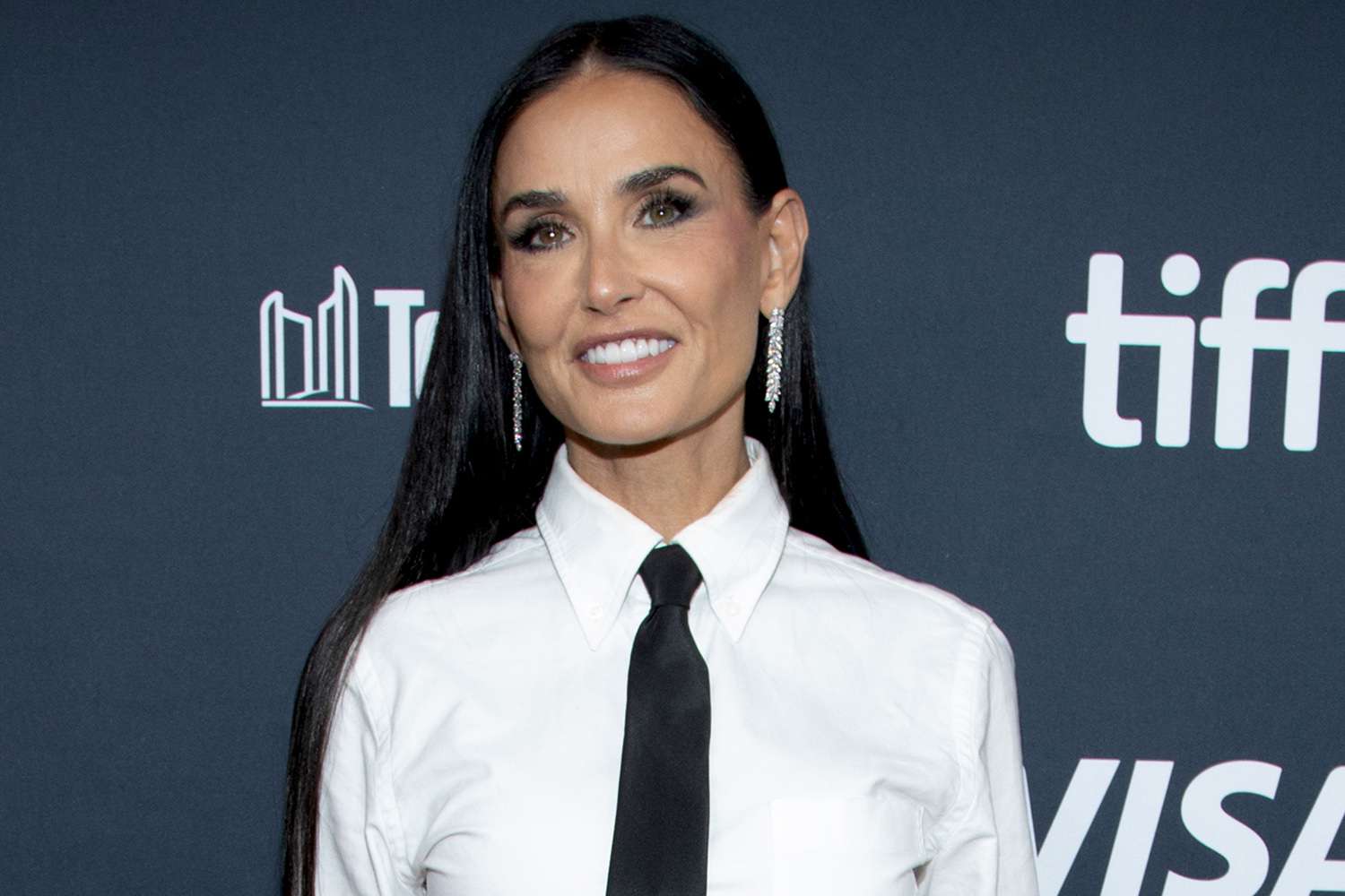 Demi Moore Is All Tied Up in Menswear-Inspired Look at Toronto Premiere of “The Substance”