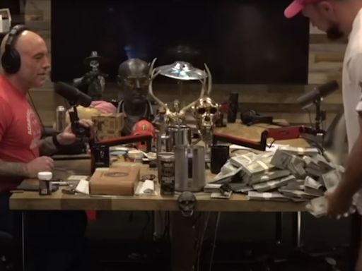 WATCH: Joe Rogan Guest Shamelessly Dumps $1 Million On Table in Middle of Podcast