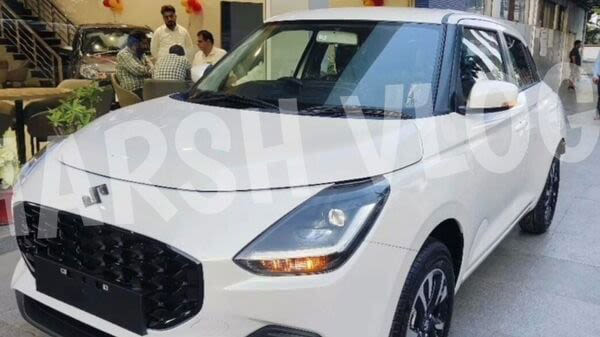 2024 Maruti Suzuki Swift starts arriving at dealerships. Check real-world images