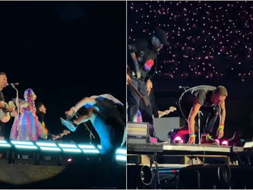 Un hombre envuelto en la bandera de Israel intenta subirse al escenario durante un concierto de Coldplay