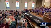 Elementary student chorus performs for special audience