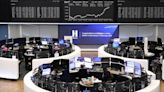European shares slip on earnings drag; Burberry leads losses