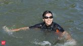 Paris mayor dips into the Seine River to showcase its improved cleanliness before Olympic events