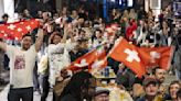 Swiss fans get ready to welcome Eurovision winner Nemo back home