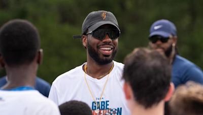 Former Southeast Raleigh QB returns home to provide opportunities for youth football players