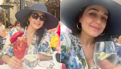 Preity Zinta Wouldn't Have Had A Chic European Summer Without Her Blue Floral Dress And Straw Hat