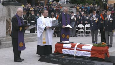 Under grey skies and rain, N.L. entombs its Unknown Soldier in solemn ceremony at war memorial