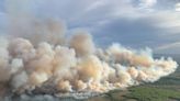Wildfires spread across western Canada