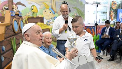 Pope visits amusement park near Rome