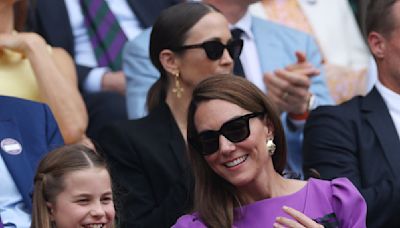 Kate, Britain's Princess of Wales, arrives to standing ovation at Wimbledon