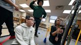 Longtime Detroit teacher leads robotics team to expose students to higher learning