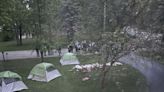 Student protesters put fake bloodied corpses on University of Michigan regent's lawn