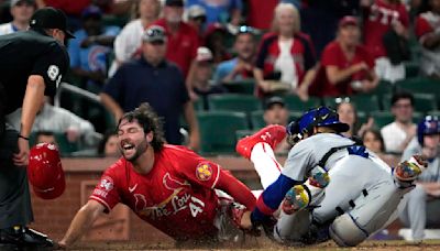 Cardinals rally in the eighth and then hold off Cubs for a 7-6 victory