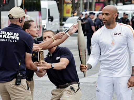 Olympic torch relay seeks to win over sceptical Parisians