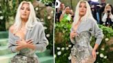 Kim Kardashian explains why she held ‘raggedy, pilled sweater’ over shocking corset dress at 2024 Met Gala