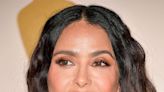 Salma Hayek Stuns In A Chic Swimsuit With A Blue Coverup For Boat Day