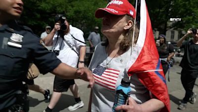 Trump supporters clash with British couple outside hush money trial