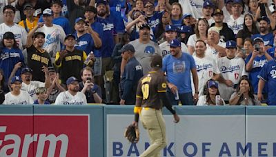 Dodgers fans throw stuff at Padres, Jurickson Profar, who earlier in game taunted them after robbing Mookie Betts of a HR