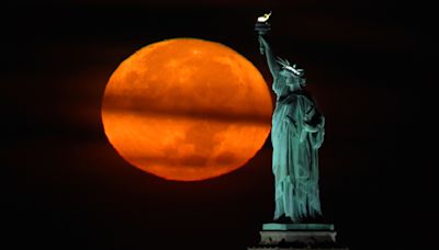 Tuesday's harvest supermoon will also be a partial lunar eclipse. How to best view the rare celestial event.