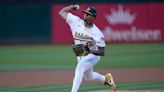 Luis Medina gets his 1st win in more than 11 months as the Athletics beat the Royals 5-1