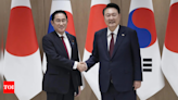 Japan's leader makes farewell visit to South Korea to strengthen his legacy of warming ties - Times of India