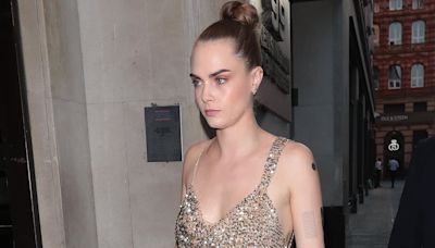 Cara Delevingne joins sister Poppy at their prosecco brand's party